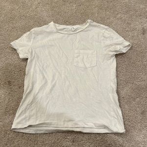 Plain white top with front pocket